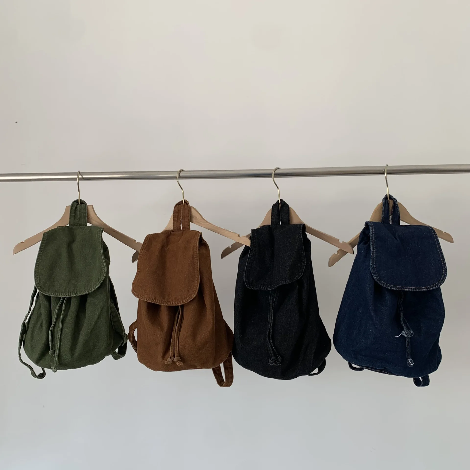 mochila-bucket-vintage-lavada-com-tampa-flip-top-e-cordao-mochila-de-grande-capacidade-simples-e-casual-moda-feminina