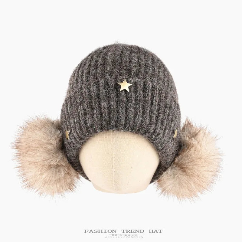 Neue Nischen-Mütze mit Metallstern-Dekoration für Männer und Frauen im Winter, dick und warm, mit Ohrenschutz und Pompon. – Detail 3