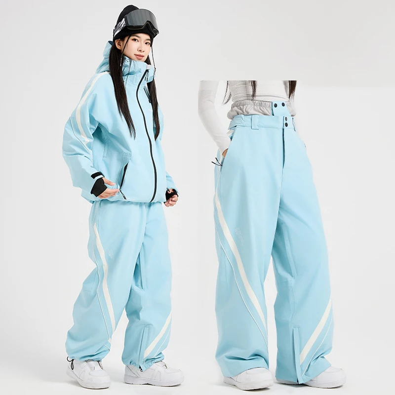 ชุดสกีกันน้ำสำหรับผู้หญิง เสื้อแจ็คเก็ตมีฮู้ด กางเกงขายาว ชุดกันหิมะสำหรับเล่นกีฬากลางแจ้ง เสื้อผ้าสำหรับเล่นสโนว์บอร์ดบนภูเขา ป้องกันลม