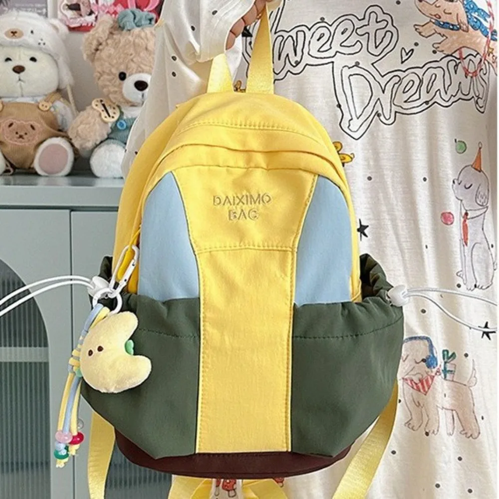 Lightweight nylon cloth waterproof student backpack splicing color collision men's and women's universal backpack play bag