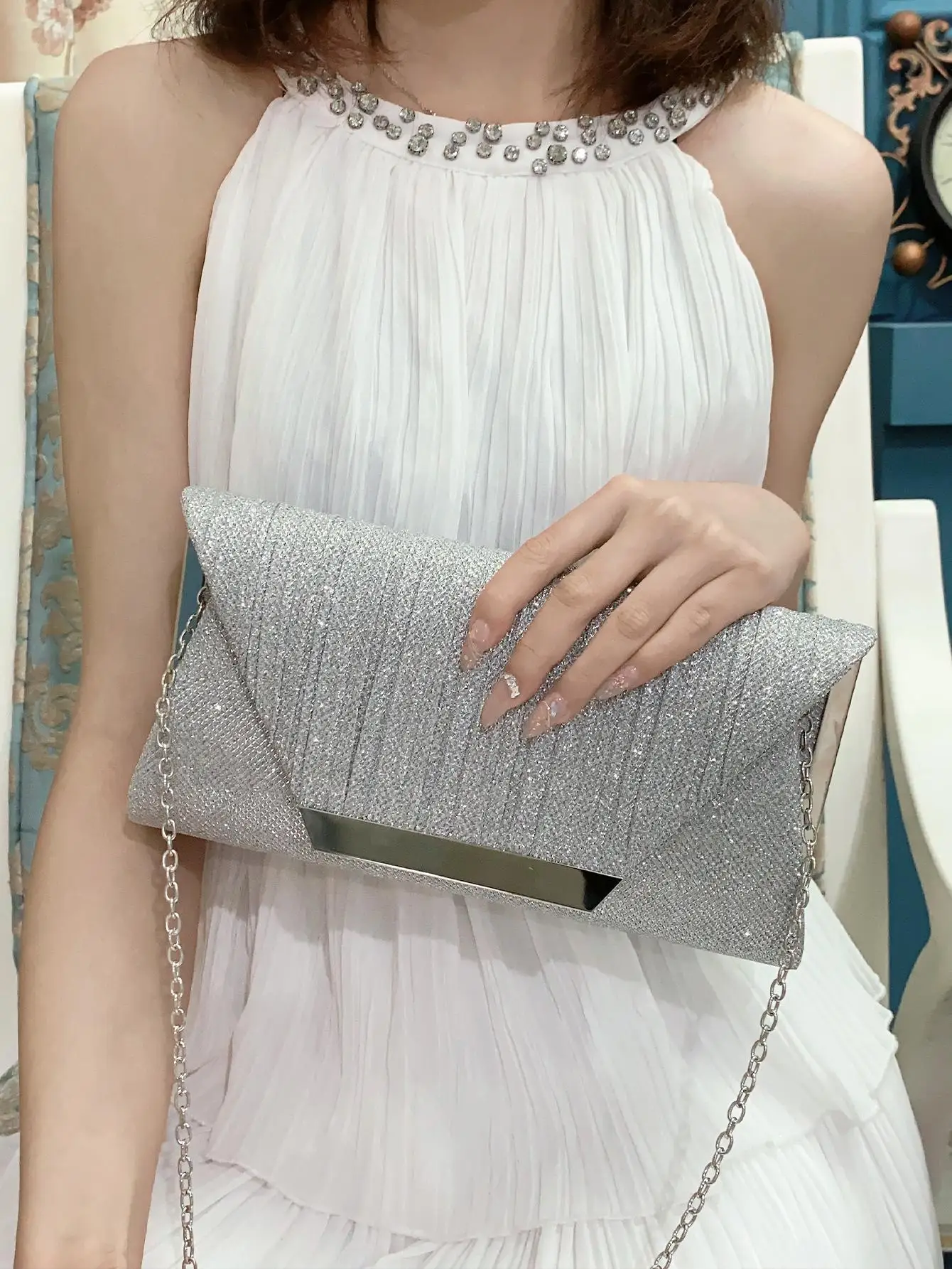 

Luxurious and attractive shiny metal clutch, elegant and stylish party bag, evening bag for birthday party and wedding.