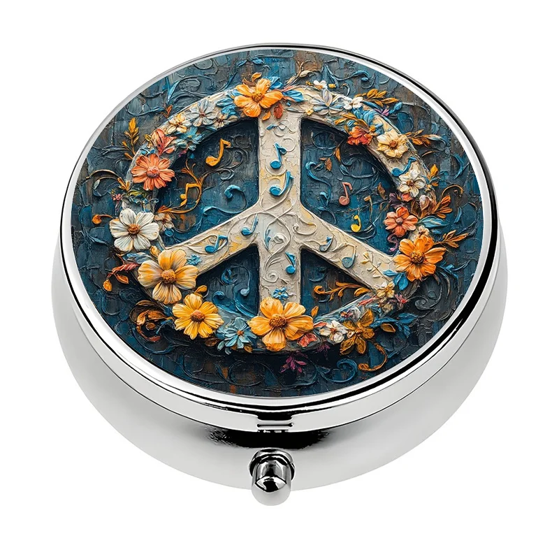 Single-layer wallet-style pill box, three-compartment design, peace and music theme. This compact decorative pill box is made of metal and can be used as a pill storage and organizer.