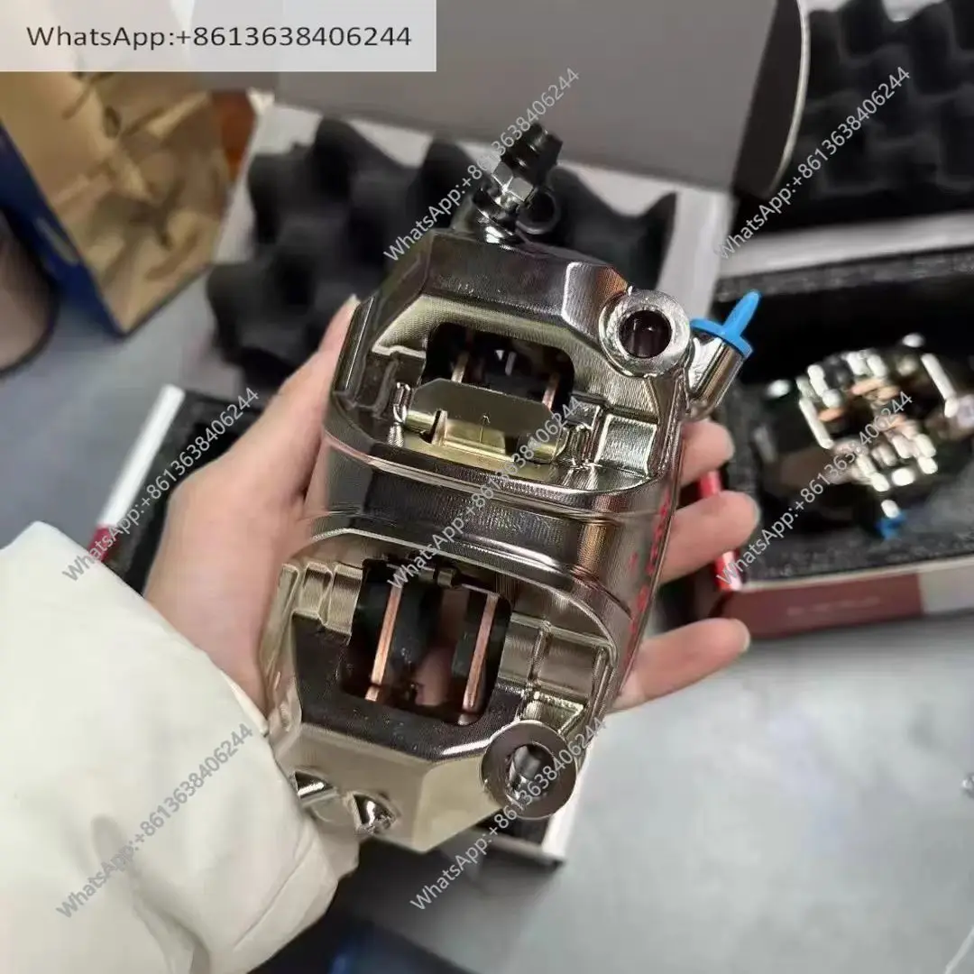 A pair of brake accessories on both sides of the 100mm shark fin caliper