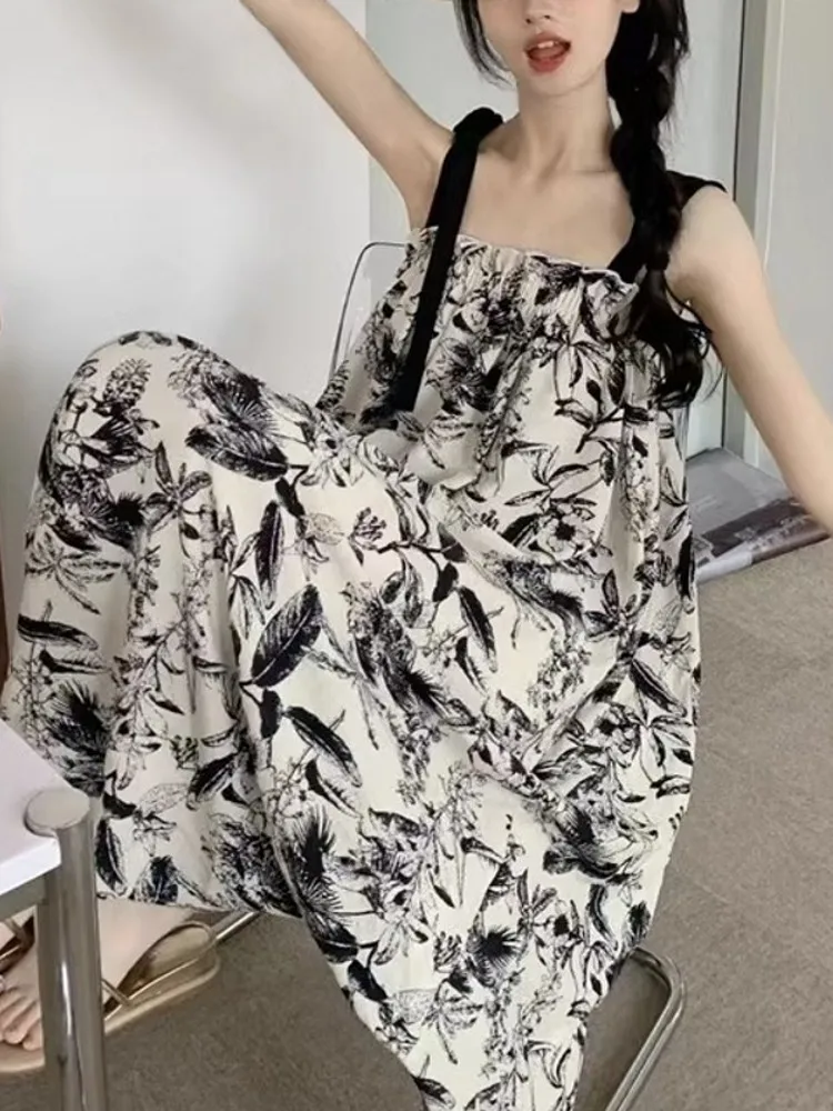 ชุดเดรสยาวทรงเอไลน์ผ้าชีฟองพิมพ์ลายดอกไม้สีน้ำ สไตล์ลำลองสำหรับฤดูร้อน เหมาะสำหรับใส่ไปเที่ยวชายหาด ช่วยพรางหุ่นให้ดูเพรียวบาง