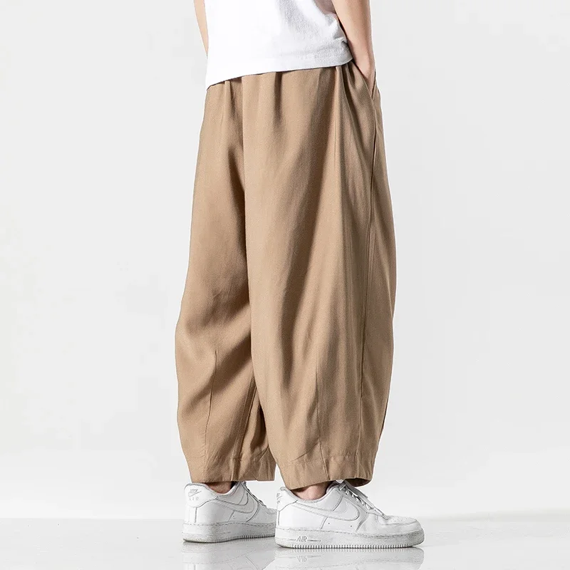 Nowe męskie spodnie haremowe w stylu Harajuku Casual dla mężczyzn spodnie Kpop bawełniane spodnie do joggingu damskie spodnie dresowe Streetwear jednolity kolor 5XL