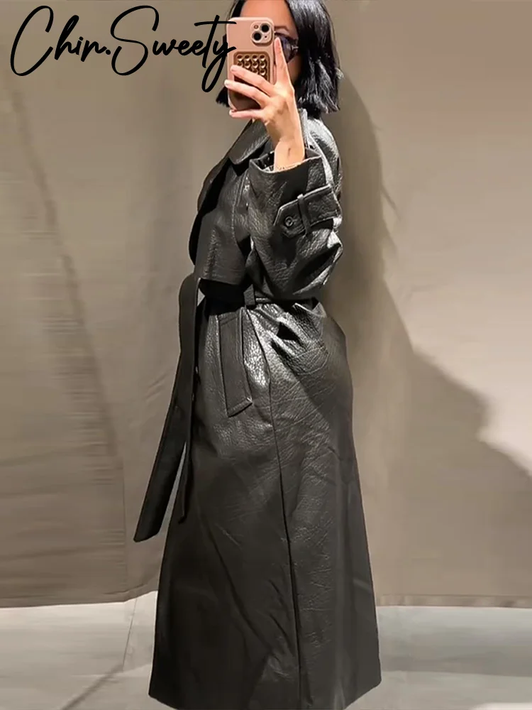 الشارع بولي Leather جلد المرأة معطف طويل موضة كم طويل زر حزام التلبيب جيب الإناث أبلى 2025 الخريف الشتاء سترة حريمي جديد