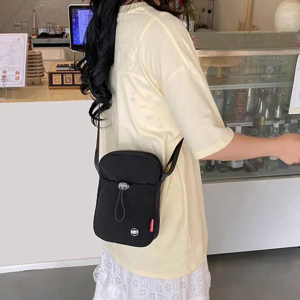

Solid Color Drawstring Crossbody Bag Waterproof Korean style Nylon Shoulder Bag Large Opening Lightweight Mobile Phone Bag