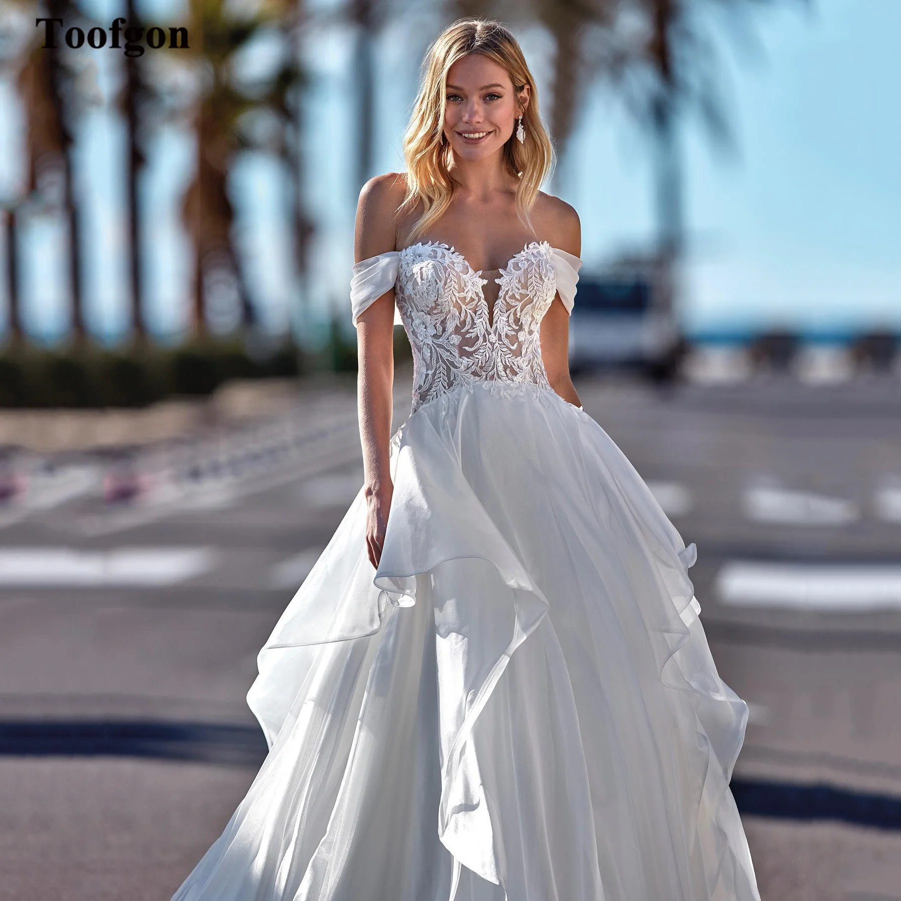 

Toofgon A-Line Ruffles Wedding Dresses Lace Appliques Sweethart Buttons Back Bridal Gowns Princess Bride Dress For Formal Party