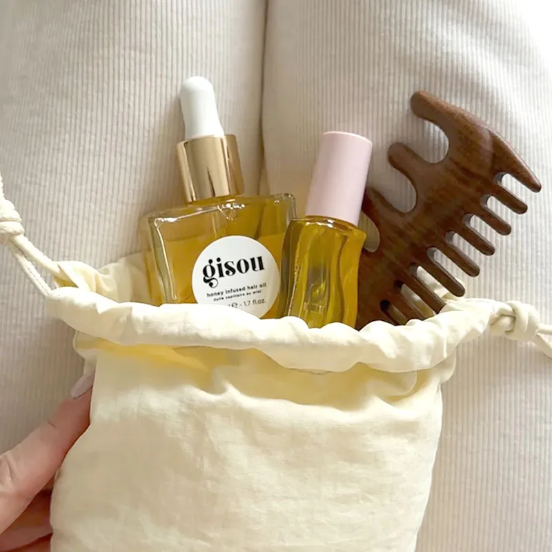 Gisou Olejek do ust i włosów z miodem, rozmiar podróżny, wzbogacony miodem Mirsalehi, głęboko odżywiający, olejek do pielęgnacji ust o zapachu arbuza i truskawki.