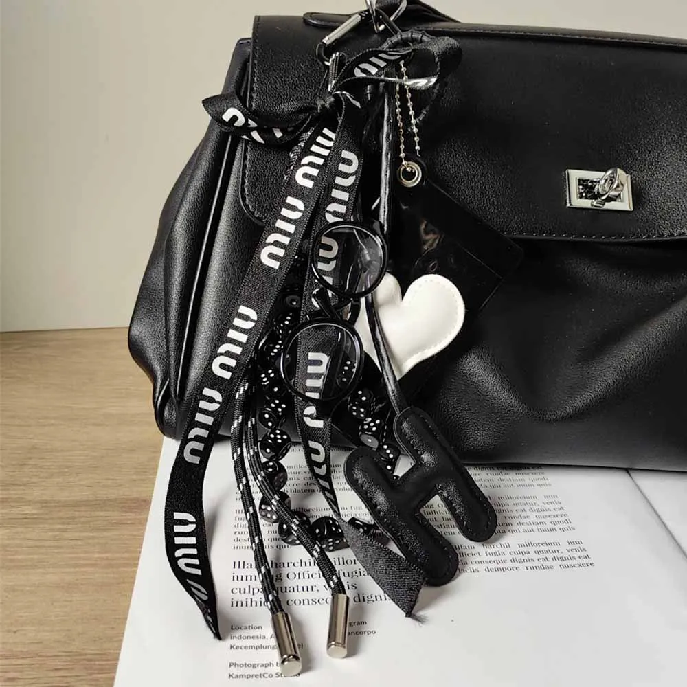 Fashionable Key Pendants Black White Heart Card Sleeve Balloon Dog Basketball Weaving Rope Woman Bag Pendant Ornaments Keychain