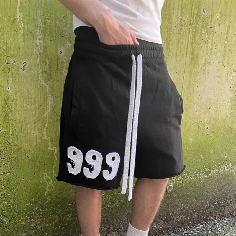 American embroidered rough edge street style casual loose drawstring five quarter pants for both men and women