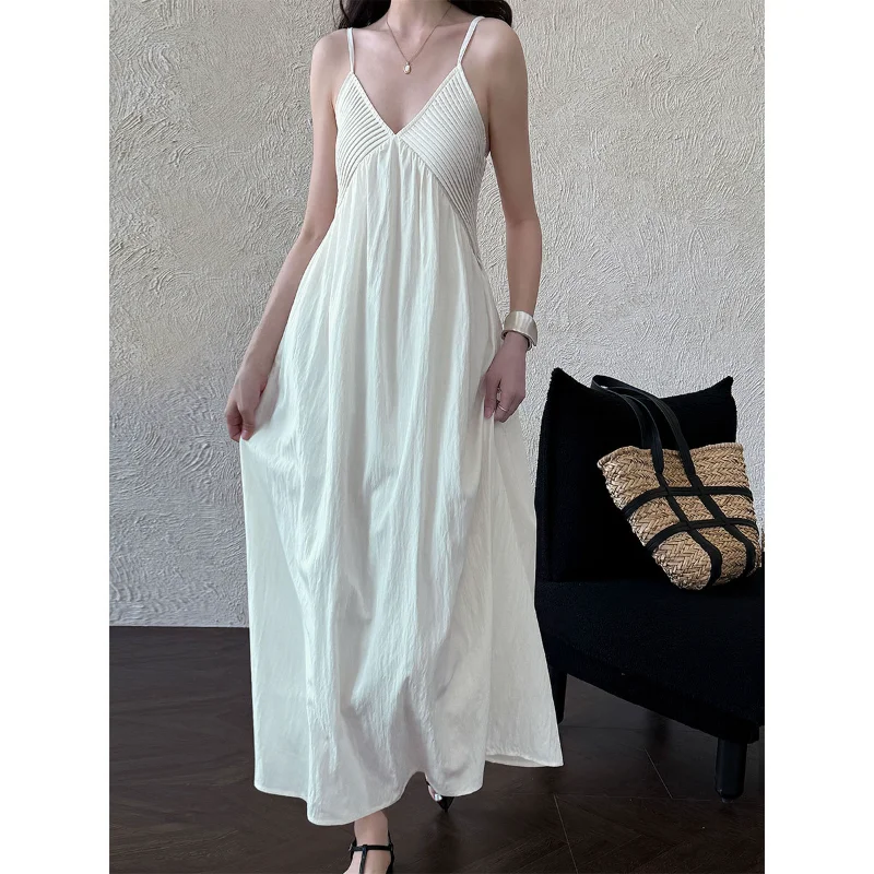 Abito da donna stile vacanza al mare con scollo a V francese Abito da donna senza maniche semplice ed elegante nero bianco sexy per festa di nozze