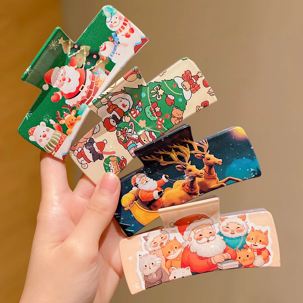 مشابك شعر عيد الميلاد مكونة من قطعتين: مطبوعات سانتا/الرنة/رجل الثلج. قماش، تصفيف الشعر، احتفالي لطيف. جيد لمظهر وهدايا عيد الميلاد.