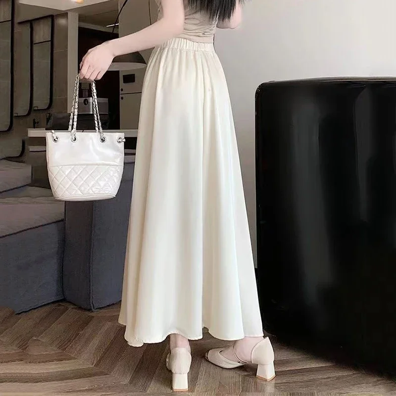 ファッションエレガントなプリーツスカートの女性 2025 新しい夏のアイスシルク固体カジュアルロングスカート女性ハイウエストすべて一致パーティースカート