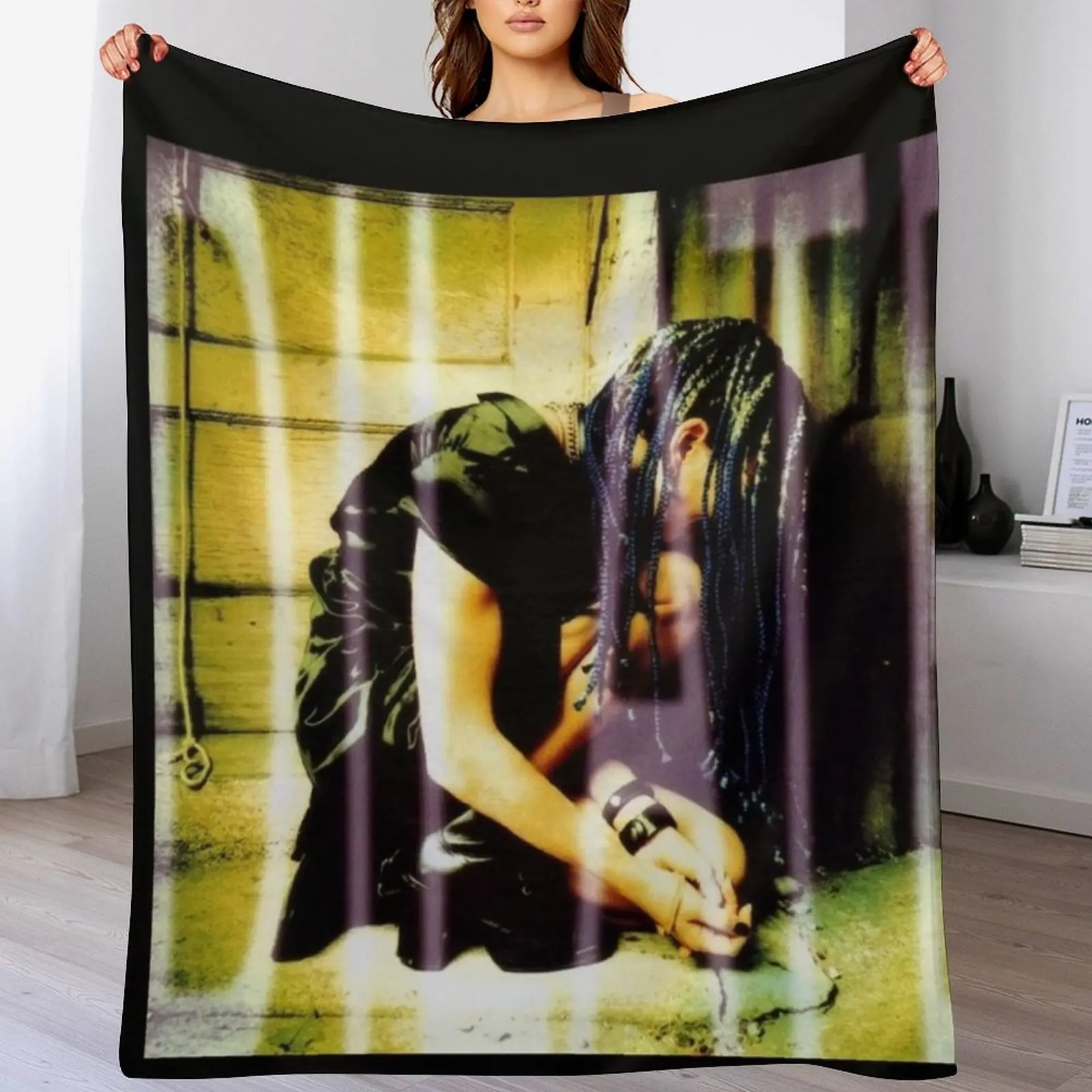 

Dilate Throw Blanket