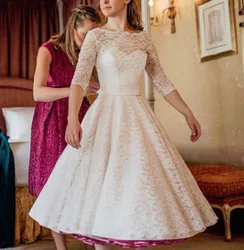 Robe de mariée en dentelle Vintage, longueur thé, demi-manches, ligne A, col rond, boutons au dos, printemps été 2023