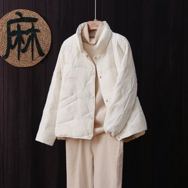 Dun dons dames korte opstaande kraag mode effen kleur lichtgewicht herfst en winter warm jack met lange mouwen