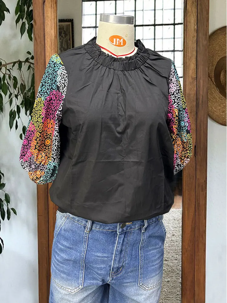 Blusa casual con cuello redondo y mangas abullonadas de algodón con estampado floral