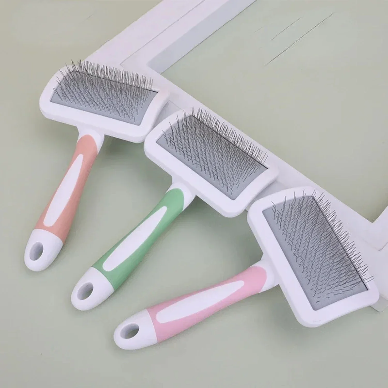 Effortlessly Maintain Your Furry Friends' Cleanliness with this Gentle and Easy Complete Massaging Pet Hair Remover Comb Brush -