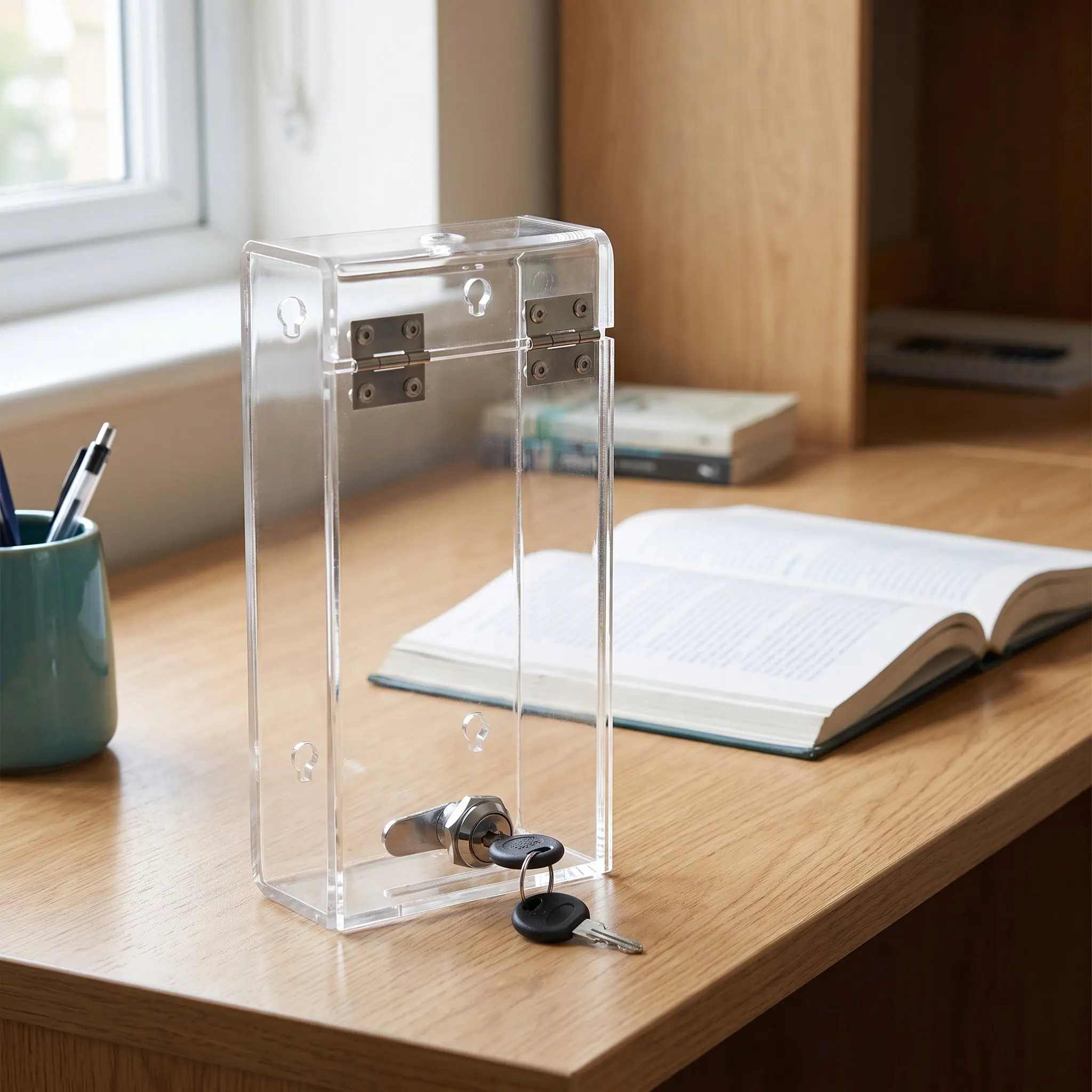 携帯電話用ロックボックス。透明で丈夫な収納ケース。5mmの穴が開いており、緊急時に通話が可能。オフィスや自宅での携帯電話の安全な保管に最適。集中力を高めるための効果的なツール。