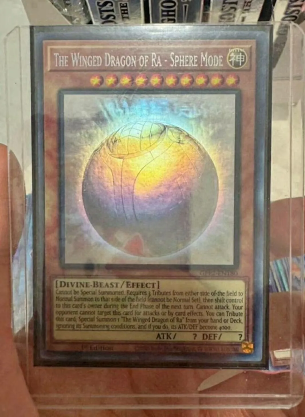 yugioh-konami-duel-monsters-gfp2-en180-the-winged-dragon-of-ra-sphere-mode-ghost-rare-english-1st-edition-collection-mint-card
