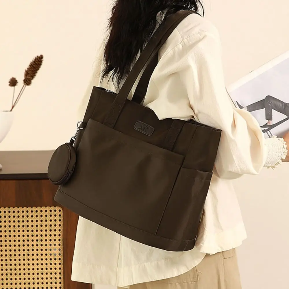 

Versatile Nylon Cloth Shoulder Bag Large Capacity Solid Color Canvas Tote Bag Simple Japanese Style Commuting Handbag