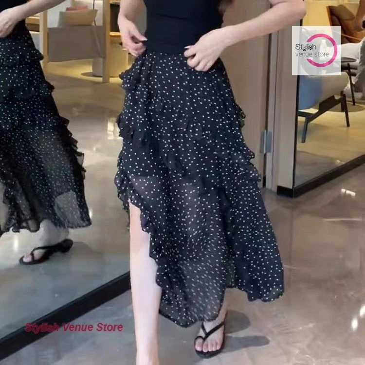 

French-style fashion polka-dot irregular stitching skirt female summer new temperament sexy elastic waist black slit long skirt.