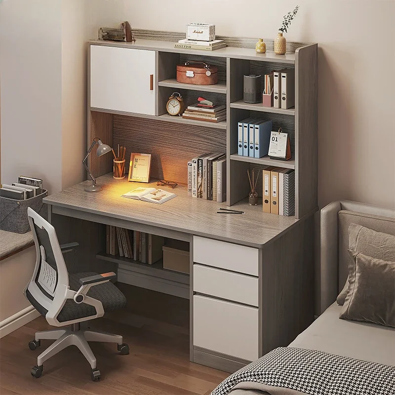 Students learn to write at home, simple office,  desktop computer desk and chair.