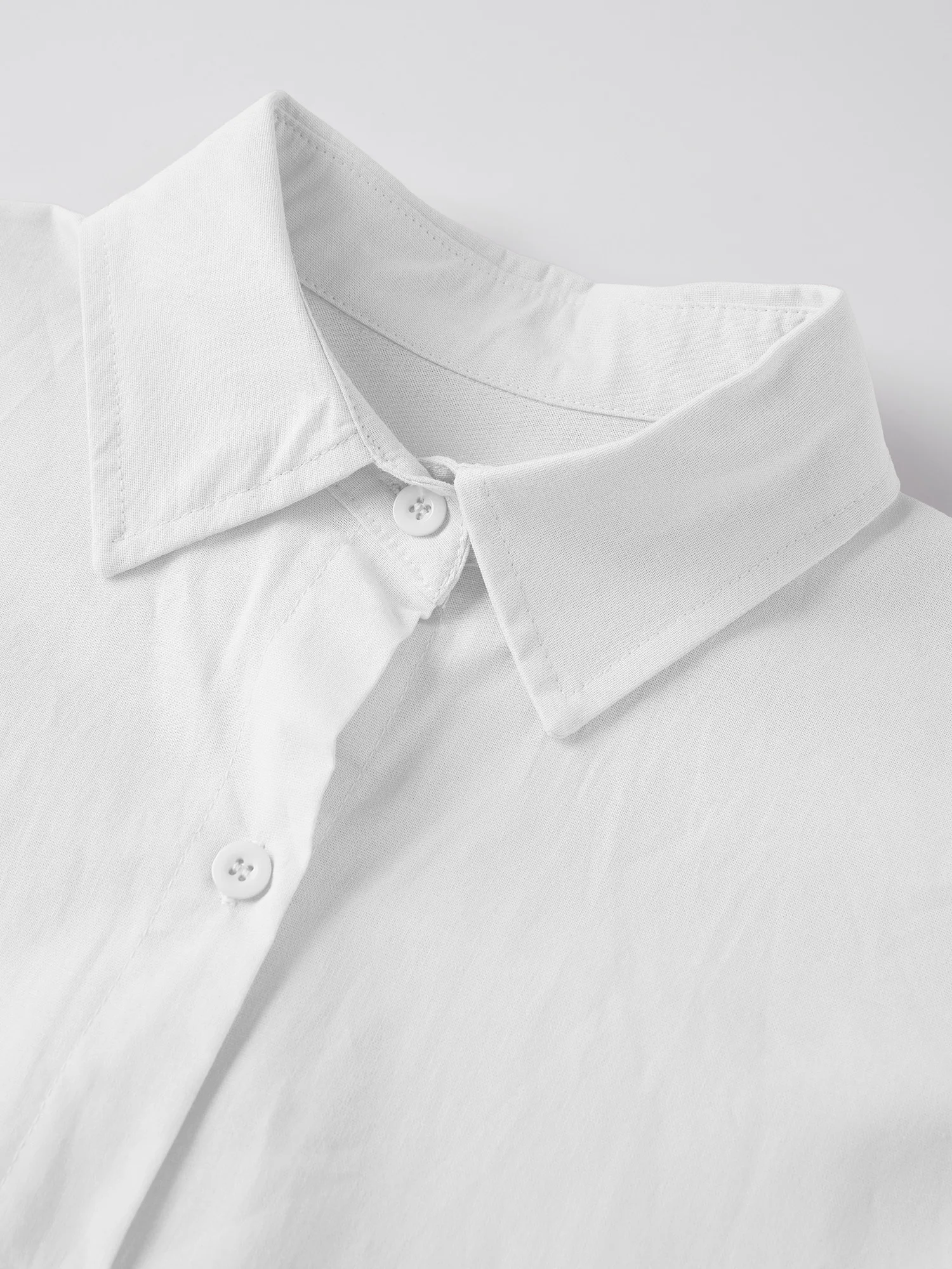 طقم صالة نسائي مكون من قطعتين مع لون سادة وأكمام طويلة وياقة على شكل طية صدر السترة وتفاصيل سفلية وسراويل خصر مرنة مع