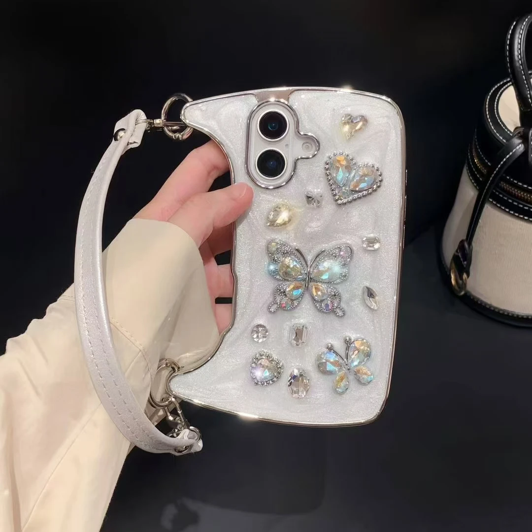 Custodia per telefono da polso con cinturino in pelle per borsa a forma di cuore con diamanti glitterati di lusso per iPhone 11 12 13 14 15 16 Pro Plus Max