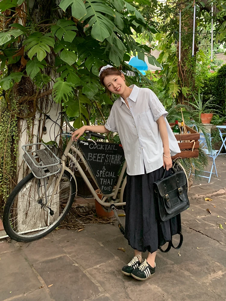 

Ретро-юбка синяя с цветочным принтом, женская летняя новинка 2026 года, А-силуэт, миди, элегантная юбка-миди Aosphere