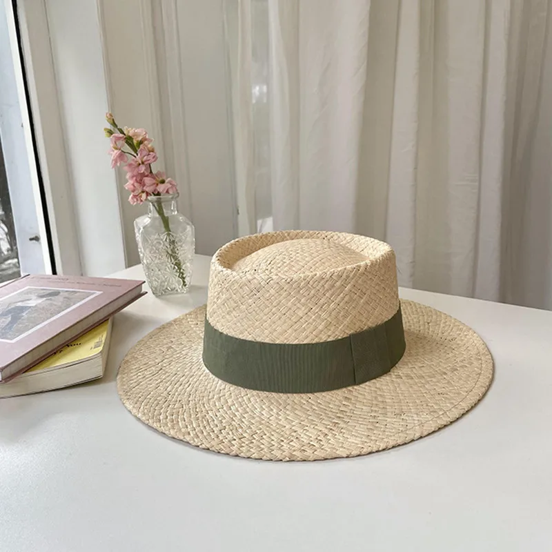 Pure hand-woven raffia flat cap simple fashion color ribbon women\'s hat outdoor beach travel sun hat wholesale spot