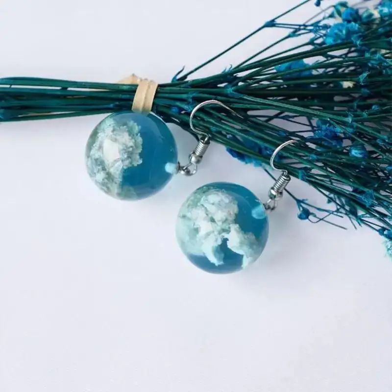 New Nightlight Planet Blue Sky White Cloud Forest Style Transparent Spherical Resin Fashion Earrings for Men and Women