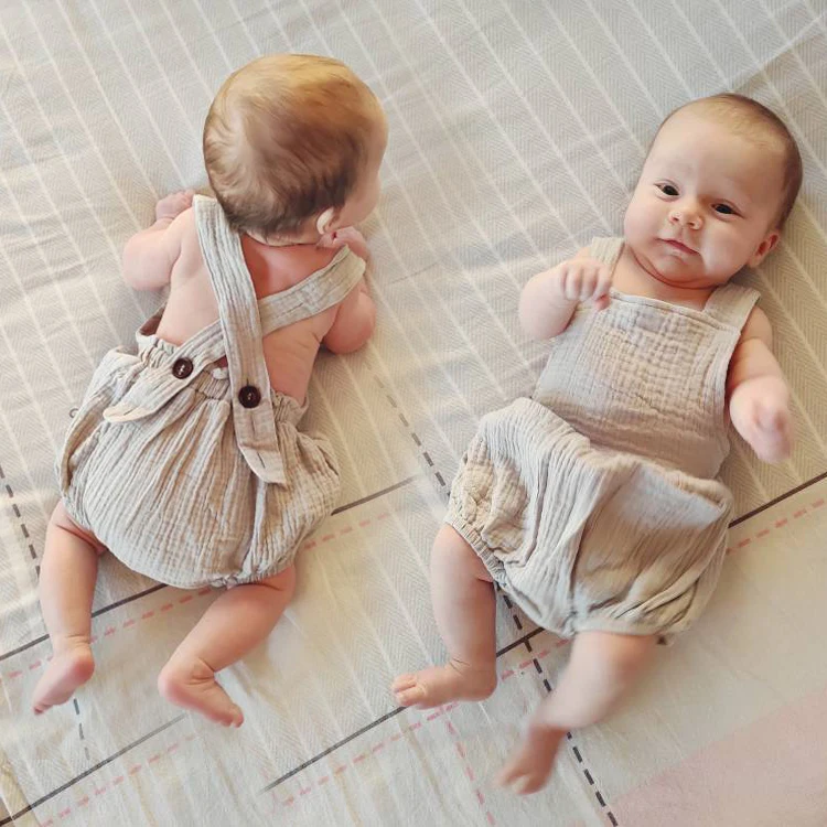 Noworodek Baby Boy dziewczyny pajacyki bawełna organiczna Playsuit kombinezony niemowlę dorywczo kamizelka bez rękawów pończoch kombinezony ubrania