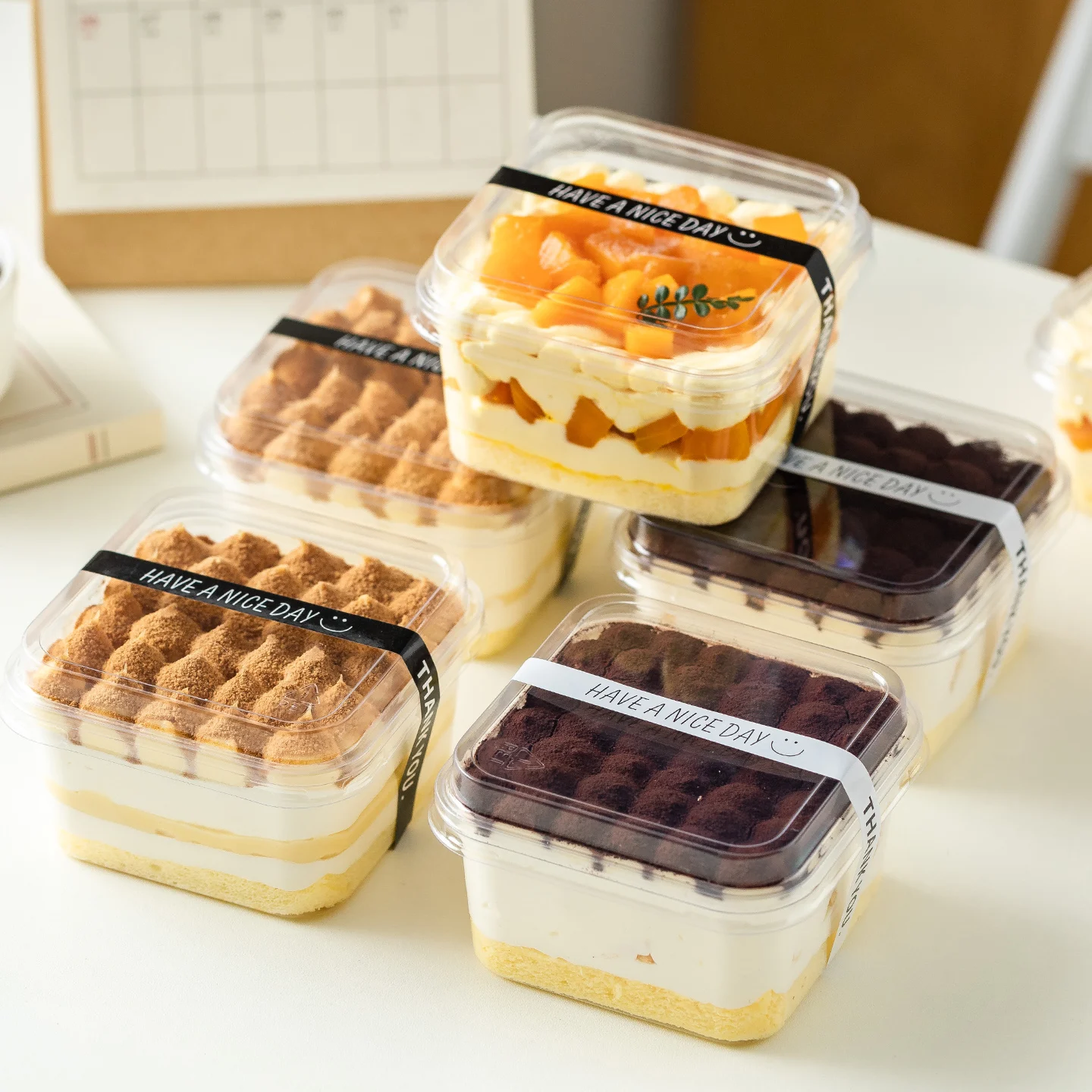 

Disposable Square Cake Box Transparent Tirsu Mousse Multi-layer Dert Paaging Box for Baking Cooking And Kitchen Use