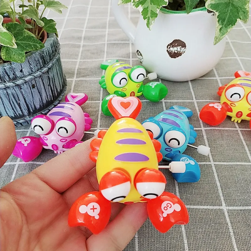 ของเล่นลานนาฬิกาใหม่การ์ตูนเด็กม้วนน่ารักสร้างสรรค์กุ้งมังกรสิ่งมีชีวิตในทะเล kado Bayi สัตว์ขนาดเล็ก