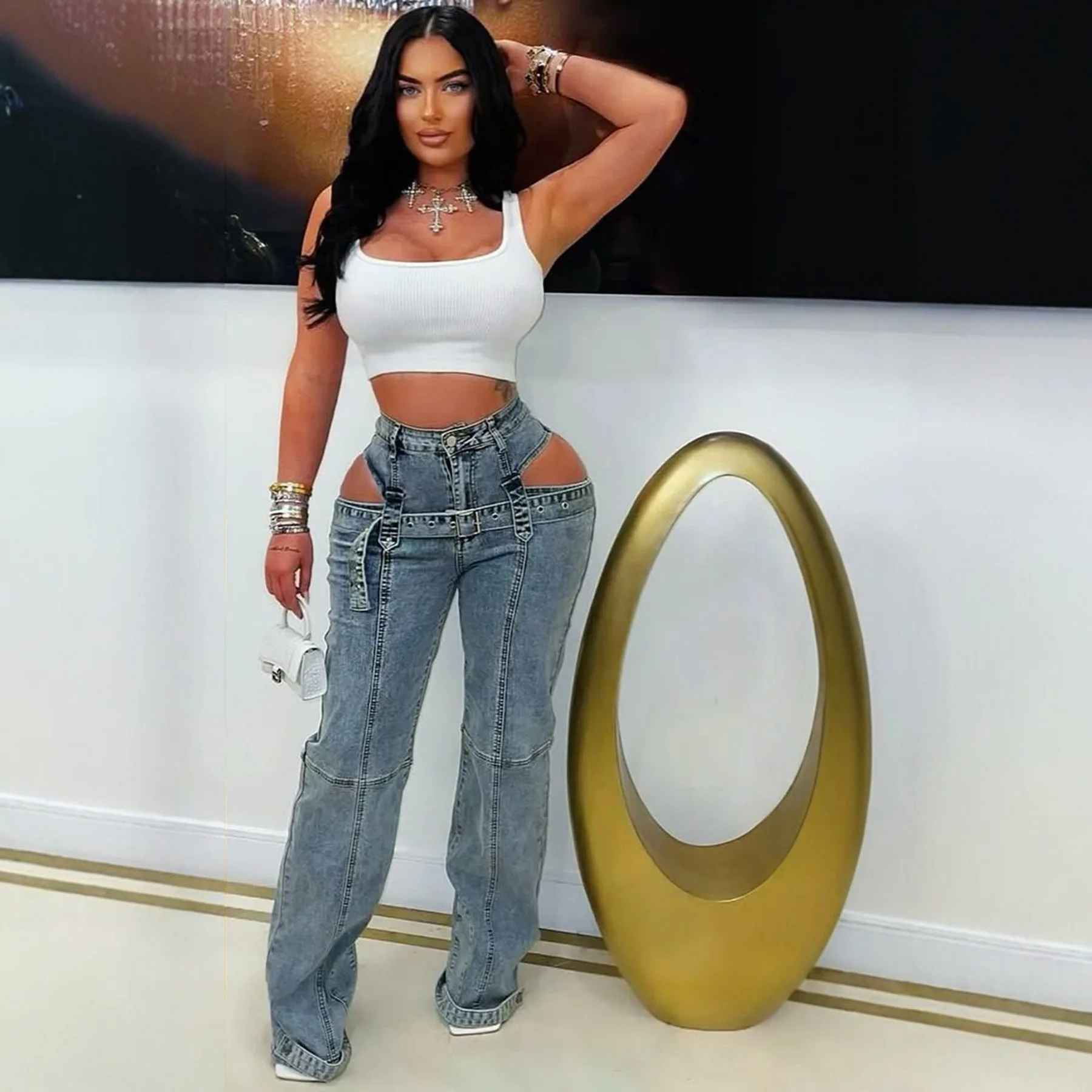 Autunno Nuovo 2025 Jeans a vita alta moda donna Pantaloni casual scavati sexy con rivetti in metallo