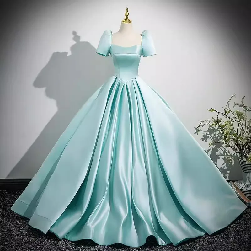 New Women's Satin Slimming Evening Dress Fashionable and Elegant Backless Strap Short Sleeved Banquet Performance Hosting Dress