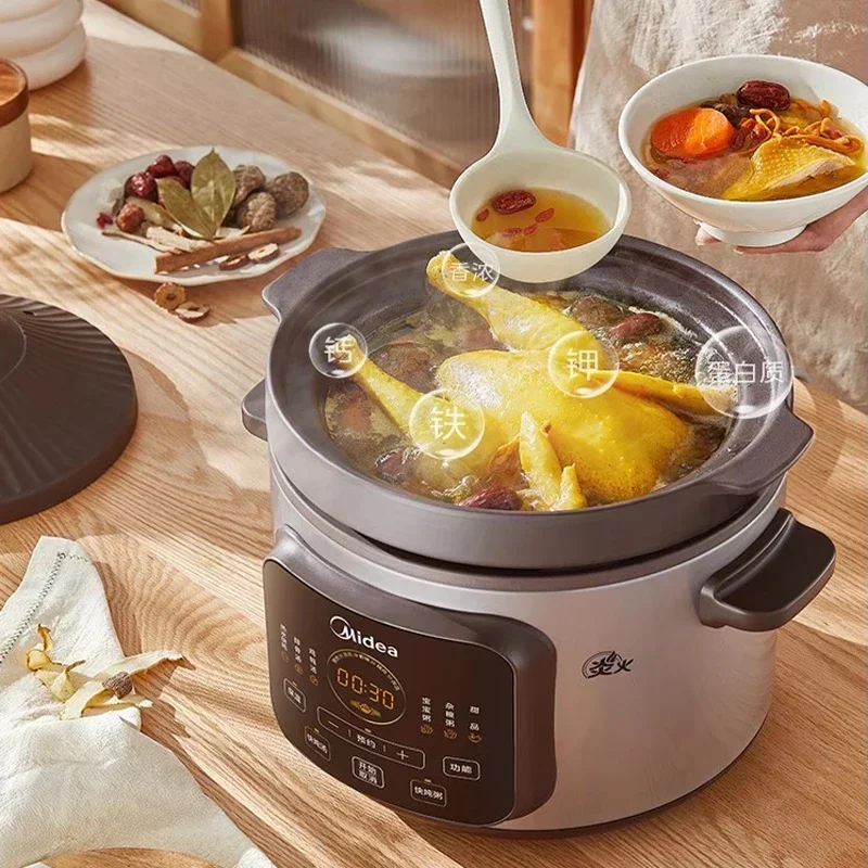Midea สีม่วงหม้อสตูว์ไฟฟ้าหม้อใช้ในครัวเรือนอัตโนมัติเซรามิคซุปสตูว์ทําอาหารโจ๊กหม้อไฟฟ้า Stewpot