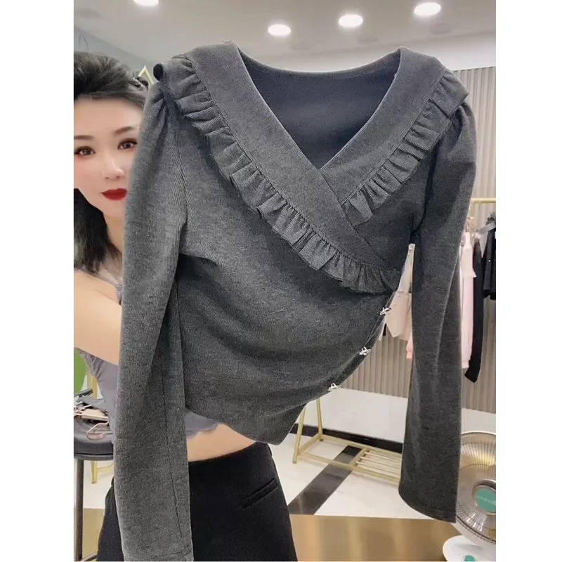 Nuovo stile primaverile e autunnale T-shirt da donna a maniche lunghe con scollo a V irregolare alla moda e versatile