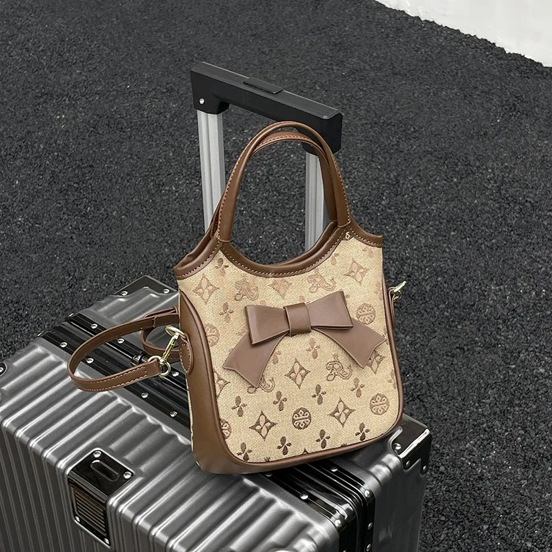 

Сумка-ведро осень-зима 2025 года с бантом, женская сумочка подмышки с монограммой, роскошная сумка-тоут с верхней ручкой, винтажная сумка через плечо,