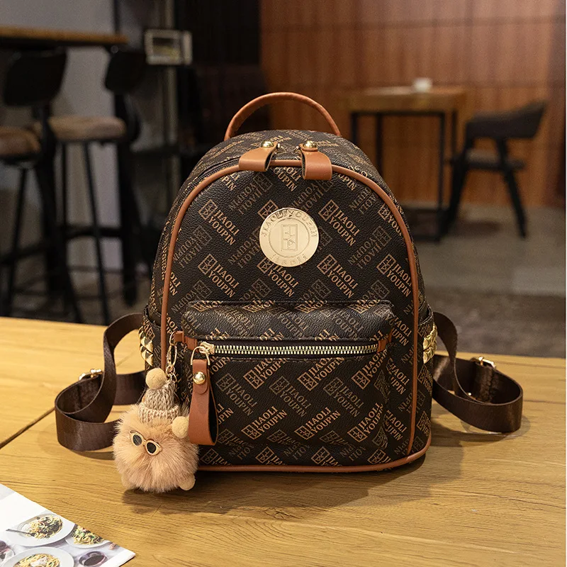 

Рюкзак с буквенным принтом в стиле ретро 2025 года для женщин — винтажный рюкзак с круглой пряжкой, трансформируемая сумка через плечо и студенческая сумка для книг