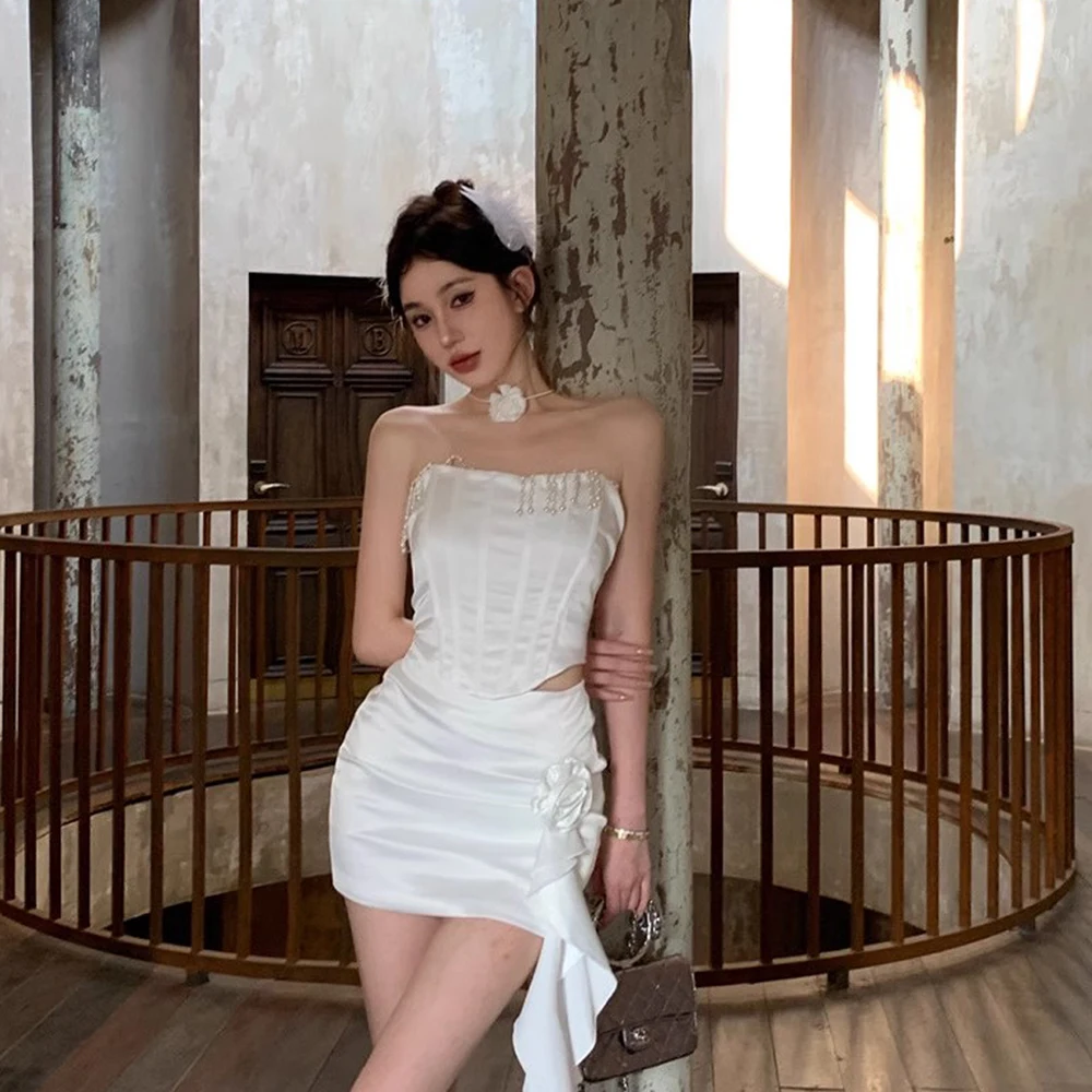 Sweet Hot Girl Mini Skirt Suit Women's Summer Sexy Slim Tassel Strapless Tops + White 3D Flower Bag Hip Skirt Two-piece Set Lady