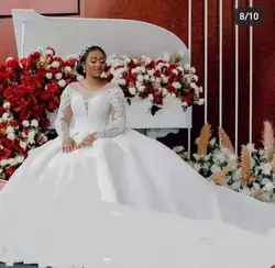 Customized New Fashion High Quality Bridal Lace Hollow Out Long Sleeve Trailing Custom Wedding Dress 2023