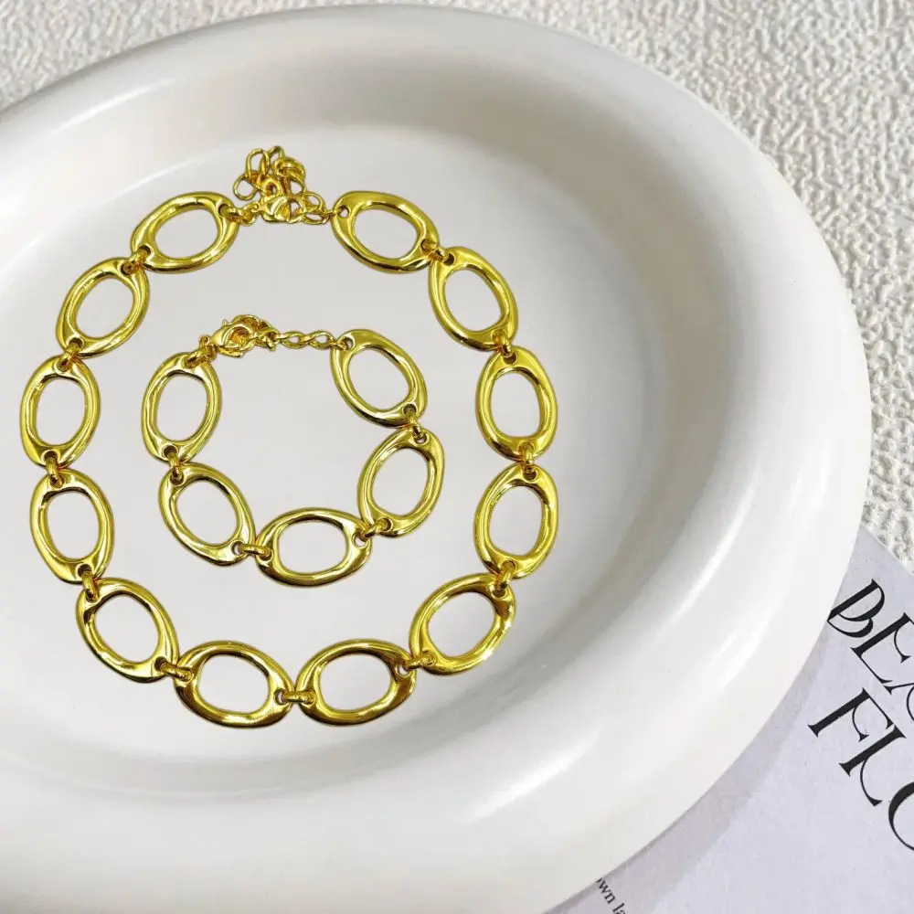 2026 Spring Punk Metallic Gold Silver Hollow Elliptical Ring Bracelet Necklace Jewelry Two Piece Set Neutral Gift