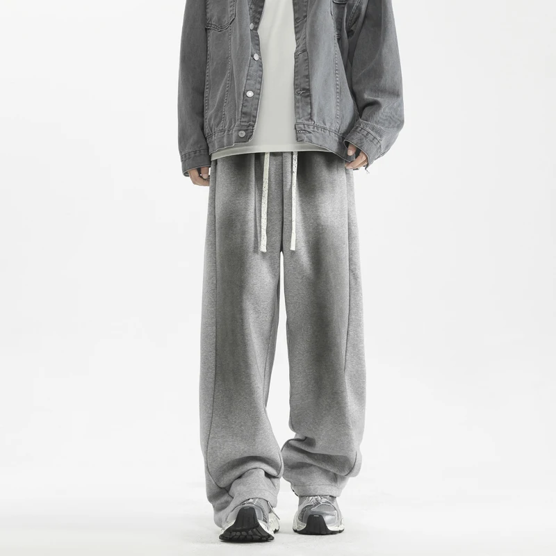 だぶだぶのパンツ男性パンツ黒カジュアルズボン弾性ウエスト冬フリースルーズフィットハイストリートトレンディメンズファッション