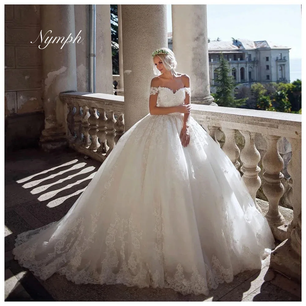 

Бальное платье Милое свадебное платье с кружевными аппликациями и бисером с открытыми плечами Свадебное платье на заказ Платье принцессы невесты Robe De Maria