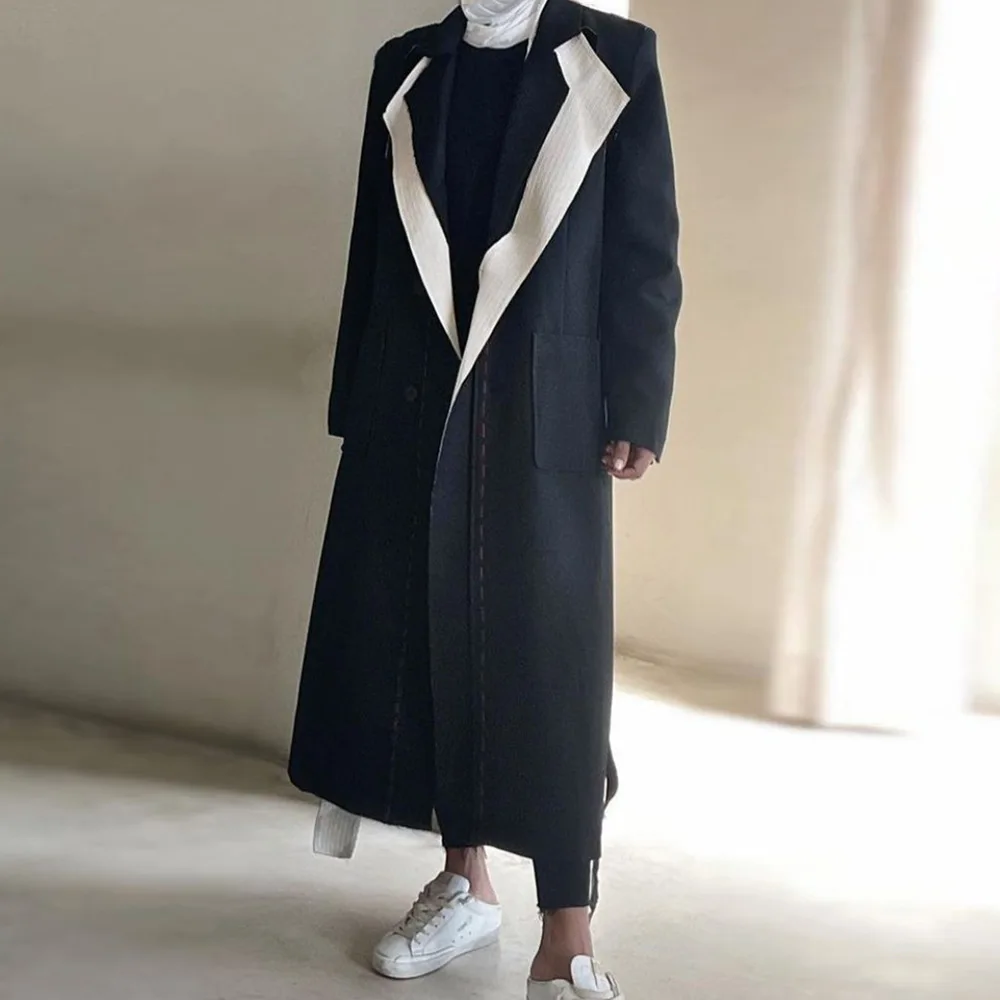 

New loose temperament raw edge color splicing collection bright line design black trench coat