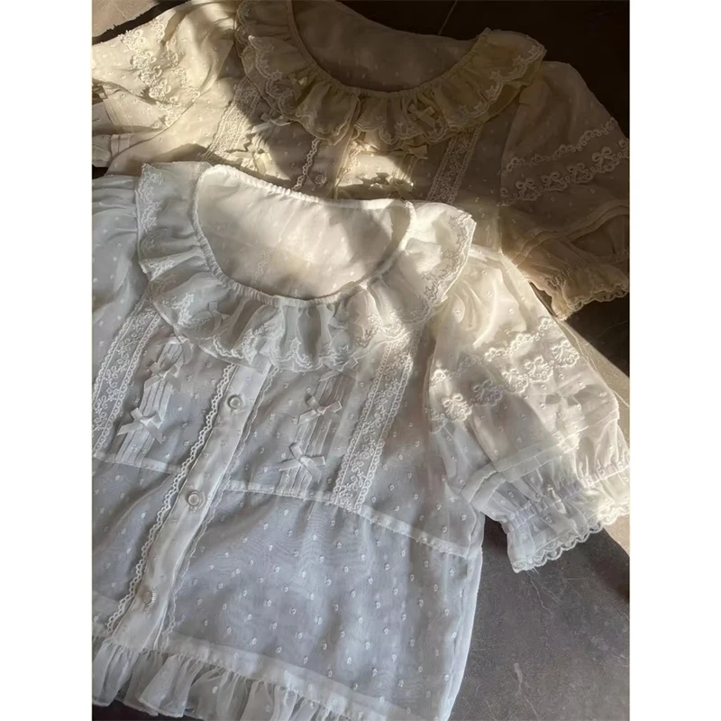 Camicie bianche Lolita giapponesi Donna Camicette in chiffon trasparente con fiocco in pizzo carino Kawaii Top estivi con design a maniche corte con volant vintage