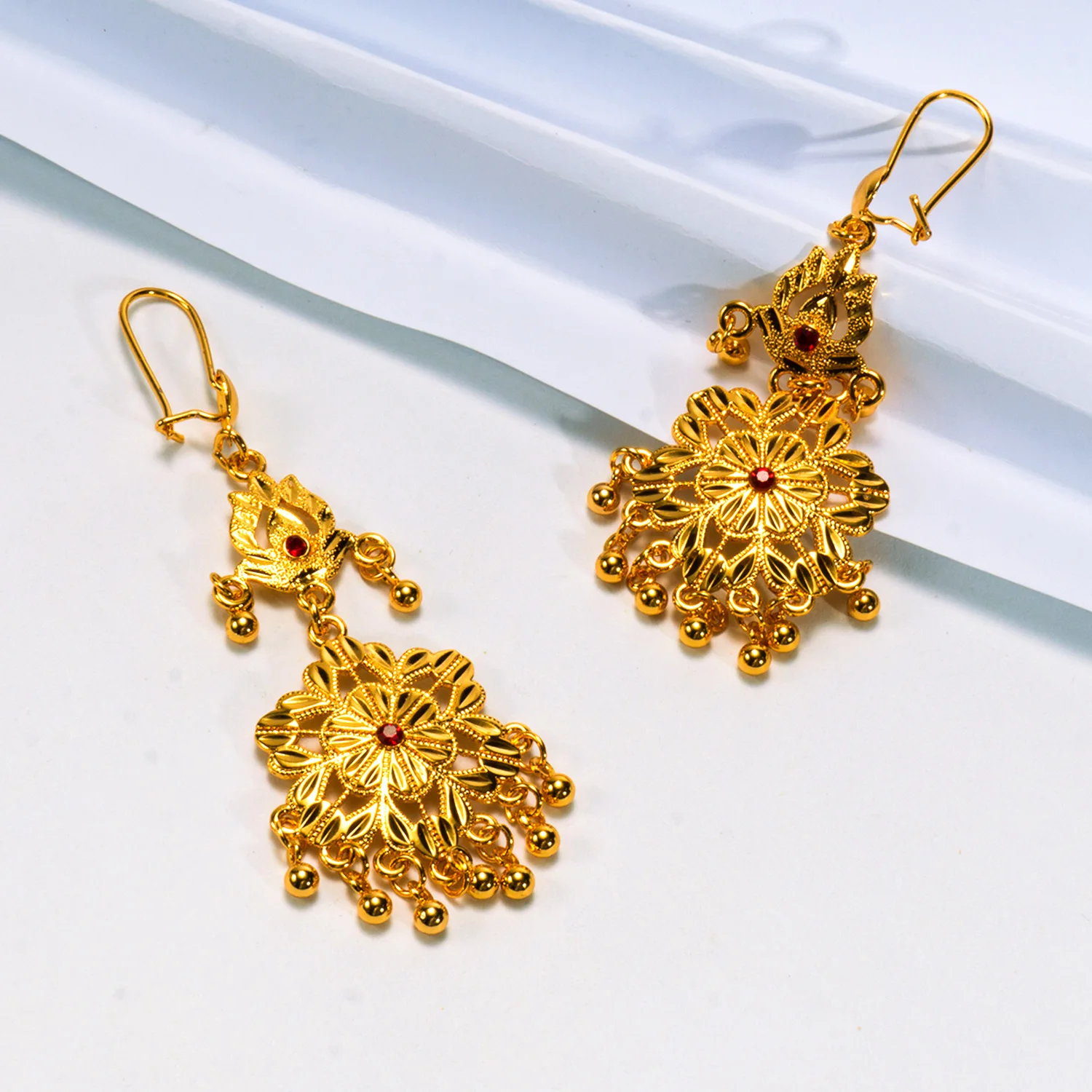 9999 gold ethnic style ruby snowflake-shaped fringed earrings Bohemian style earrings with high-end appeal